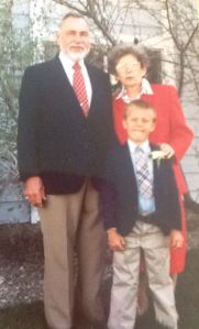 Mom, Dad, and Court on the day he celebrated his First Communion. 