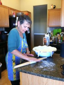 I'm preparing the pizza dough in the bowl.