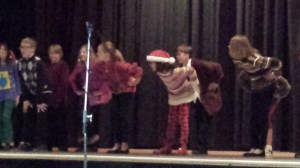 Addie is just to the right of the microphone.