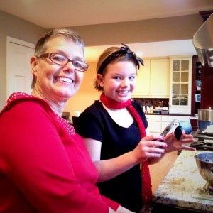 Addie and Nana clean mussels in preparation for Christmas Eve dinner.