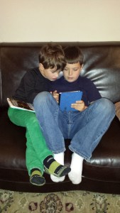 Joseph and Alastair deeply absorbed in, well, something.