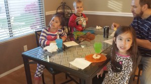 Austin joins his cousins for donuts.