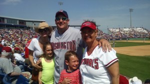 The whole Borman clan enjoy the ball game.