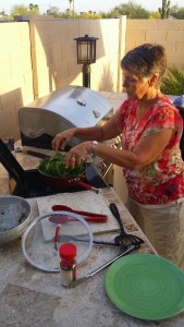 Kris prepares one of our first meals outdoors.