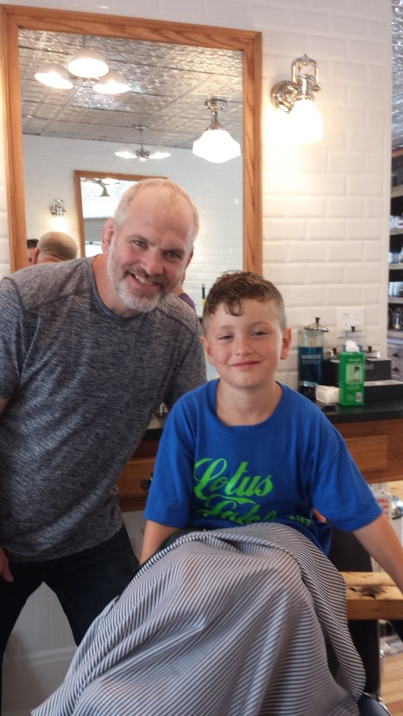 Joseph and his barber, Todd.