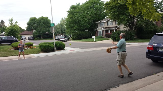 Addie and Papa play catch in the street. No broken windows. Or bones.
