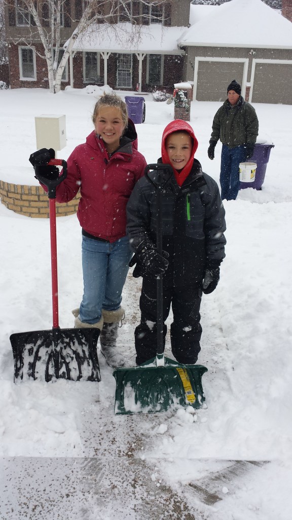 Addie Alastair shoveling snow