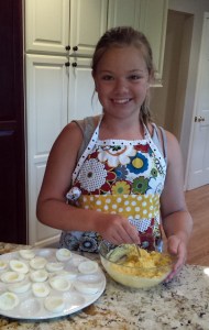 Addie with deviled eggs cropped