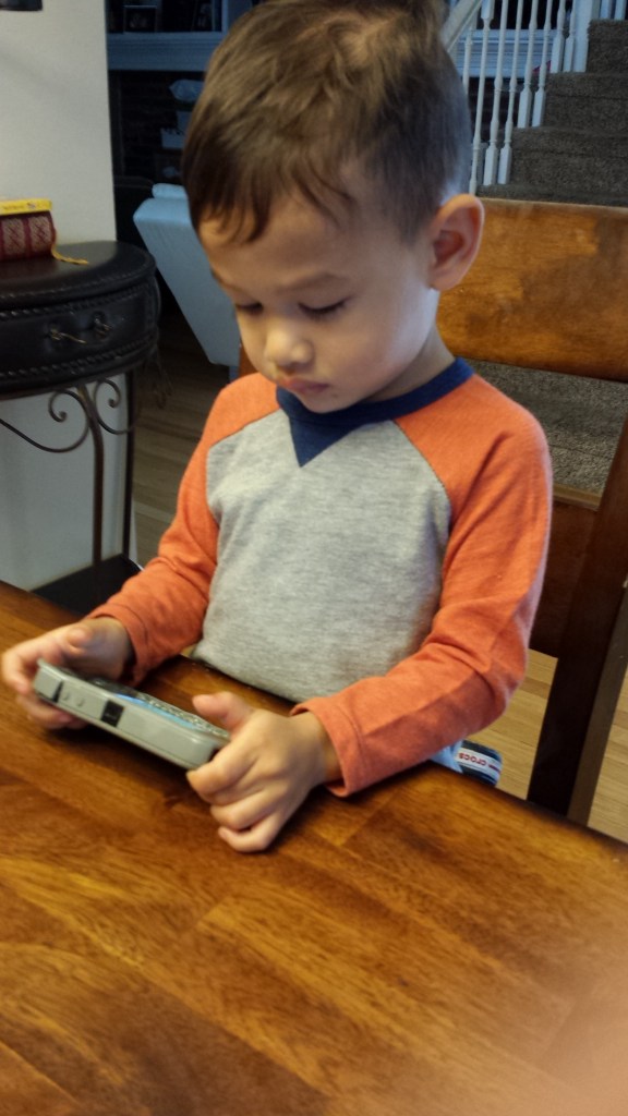 Cole playing with phone 5.16